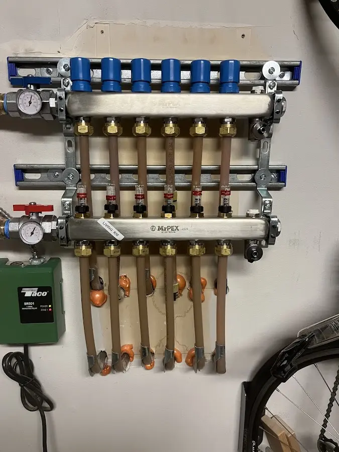 Plumber performing Leak Detection at a residential property in Elmira Heights